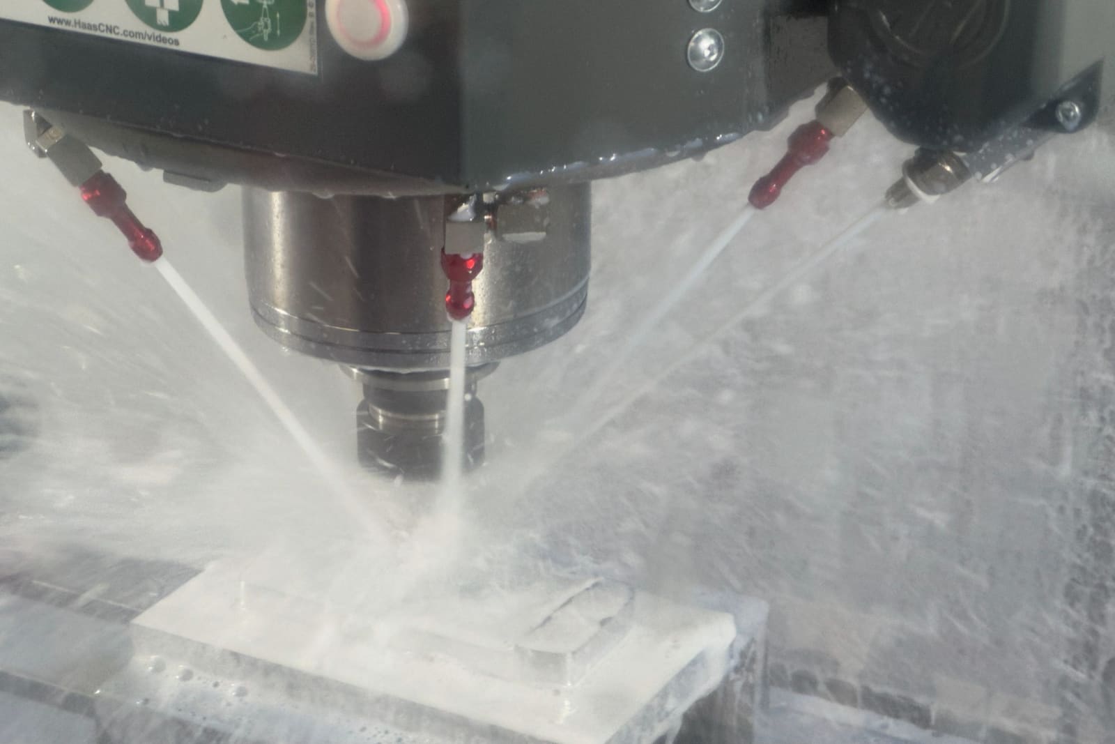 CNC spindle cutting aluminum under coolant